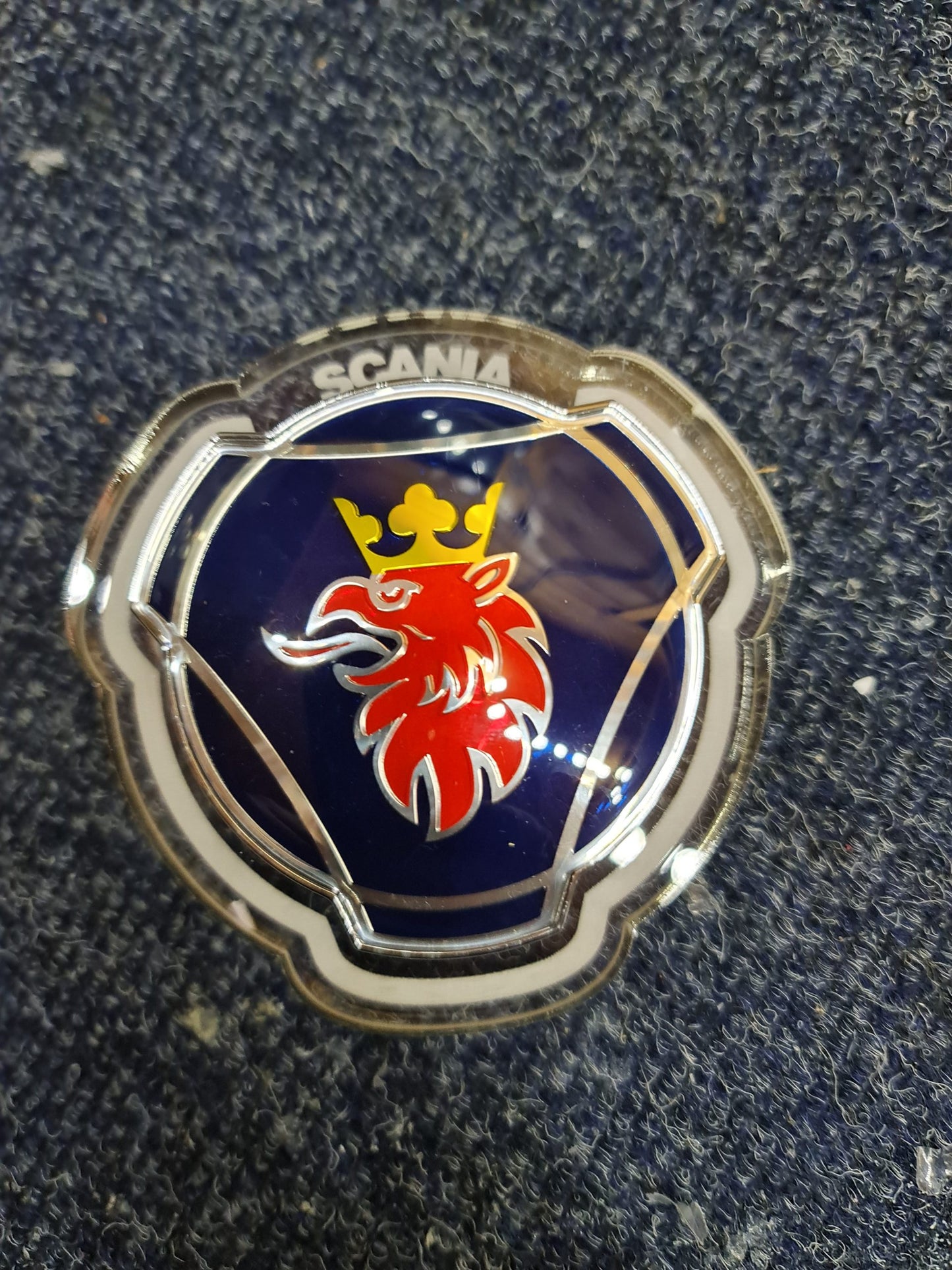 Scania grille logo with LED lighting orange