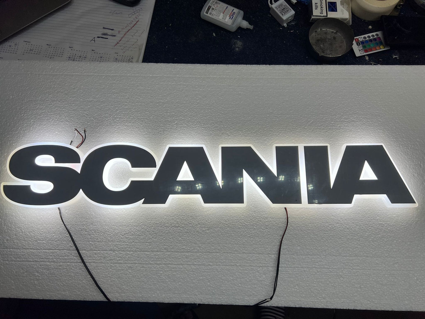 Scania letter grille logo in white