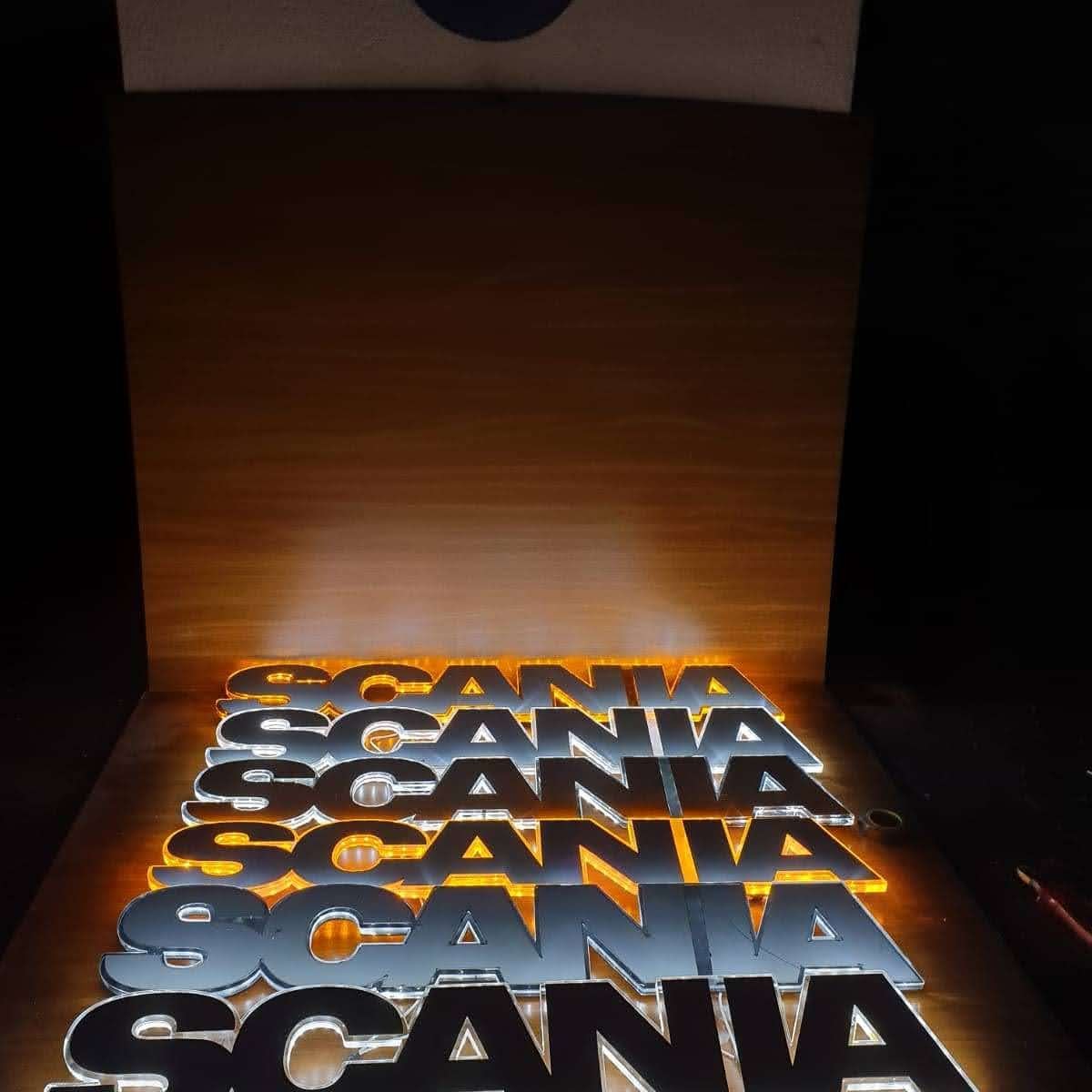 Scania letter grille logo in white